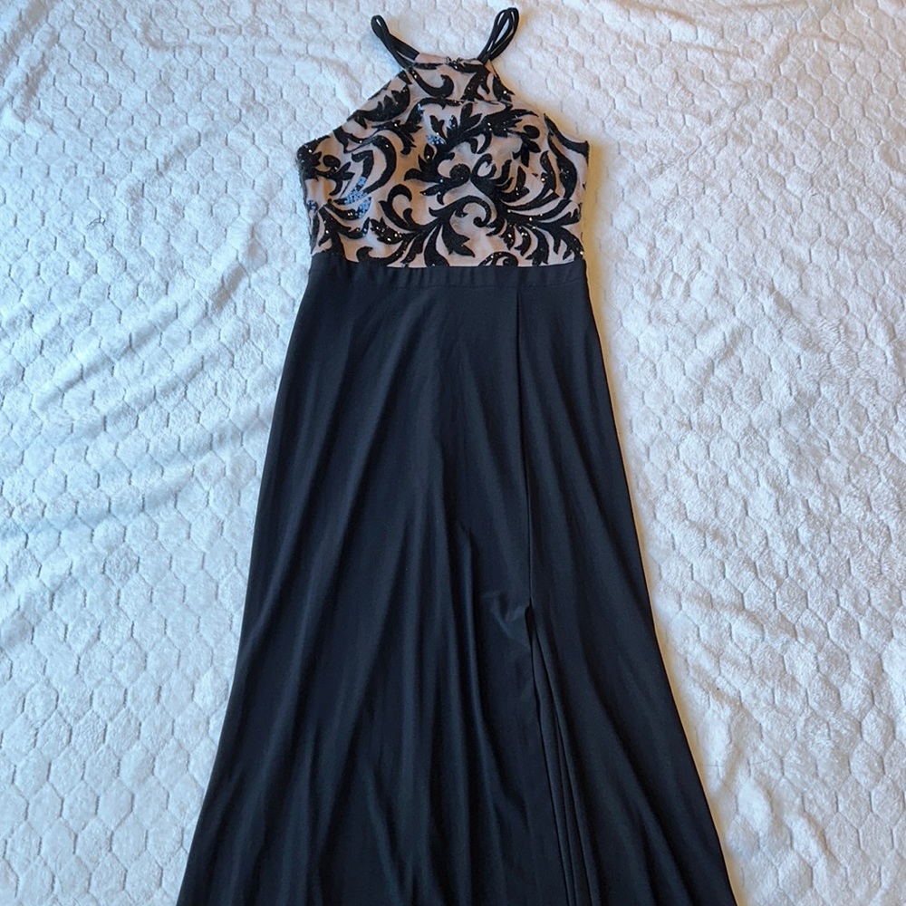 Beautiful black and beige gown with high slit on left leg